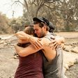 Resident Austin Giannuzzi cries while embracing family members at the burned remains of their home during the LNU Lightning Complex fire in Vacaville, California on August 23, 2020