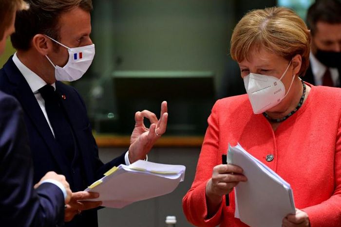 The EU leaders' summit began with smiles and COVID-proof elbow bumps, but soon got down to tense negotiations