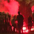 Protesters hurl firecrackers and flares at police in a fourth night of demonstrations in Belgrade