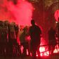 Protesters hurl firecrackers and flares at police in a fourth night of demonstrations in Belgrade