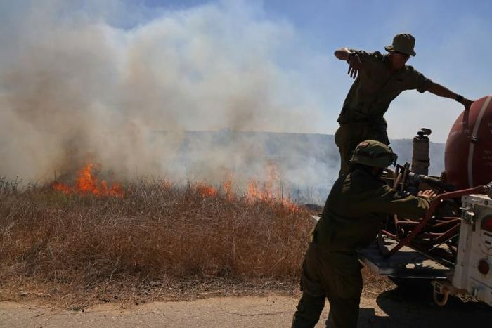 Blazes sparked by fire bombs floated across the Gaza border on balloons have caused damage to crops in southern Israel