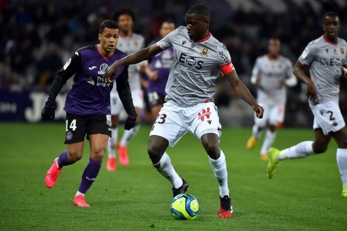 Chelsea have signed former Nice defender Malang Sarr (R)