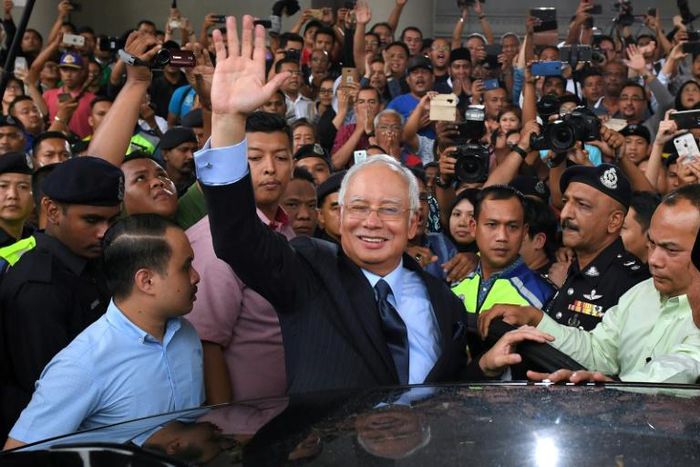 Malaysia's former prime minister Najib Razak, seen here in September 2018, is facing four charges of corruption and three of money-laundering in the case