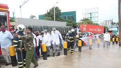 KDF soldiers with disinfection and crowd control at the Likoni Channel crossing