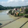 The Lakshman Jhula footbridge over the Ganges river in India, made famous by the Beatles in the 1960s