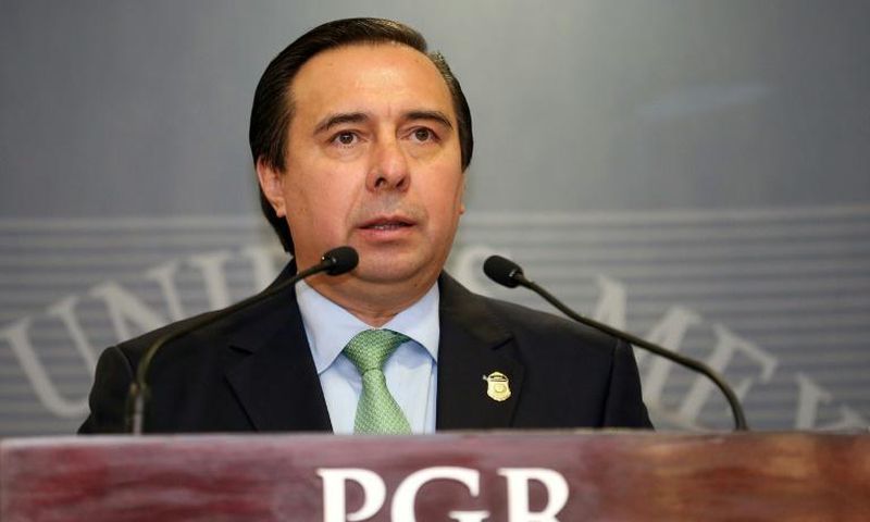 Tomas Zeron (pictured in a September 2015 handout photo), who was head of Mexico's Criminal Investigation Agency, is wanted over allegations of serious irregularities in the probe into one of the country's worst human rights tragedies