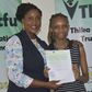 Former MP Alice Ng'ang'a with a bursary beneficiary.