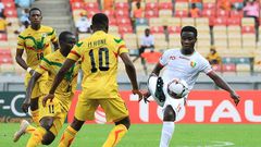 Guinea midfielder Sylla (R) scored first in a 2-0 win over hosts Cameroon