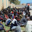 Tens of thousands of refugees and asylum-seekers -- similar to these African migrants who fled Libyan battle zones, pictured April 2019 at at a detention center in Zawiya -- have been stranded in chaos-wracked Libya