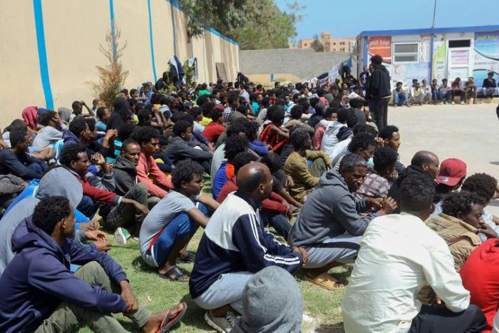 Tens of thousands of refugees and asylum-seekers -- similar to these African migrants who fled Libyan battle zones, pictured April 2019 at at a detention center in Zawiya -- have been stranded in chaos-wracked Libya