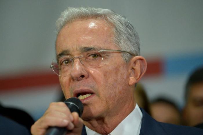 Former Colombian president Alvaro Uribe speaks to supporters in October 2019 at the headquarters of the Democratic Center political party in Bogota, after his hearing at the Supreme Court over witness tampering