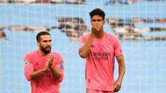'Blame me': Real Madrid's French defender Raphael Varane (right) reacts after Manchester City's Raheem Sterling opened the scoring