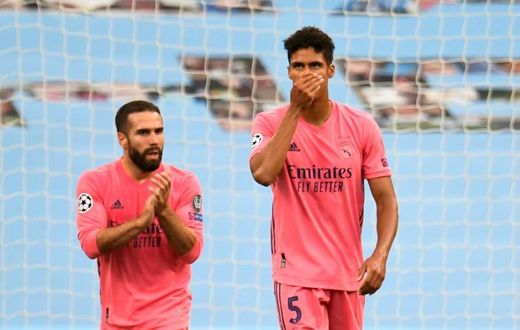'Blame me': Real Madrid's French defender Raphael Varane (right) reacts after Manchester City's Raheem Sterling opened the scoring