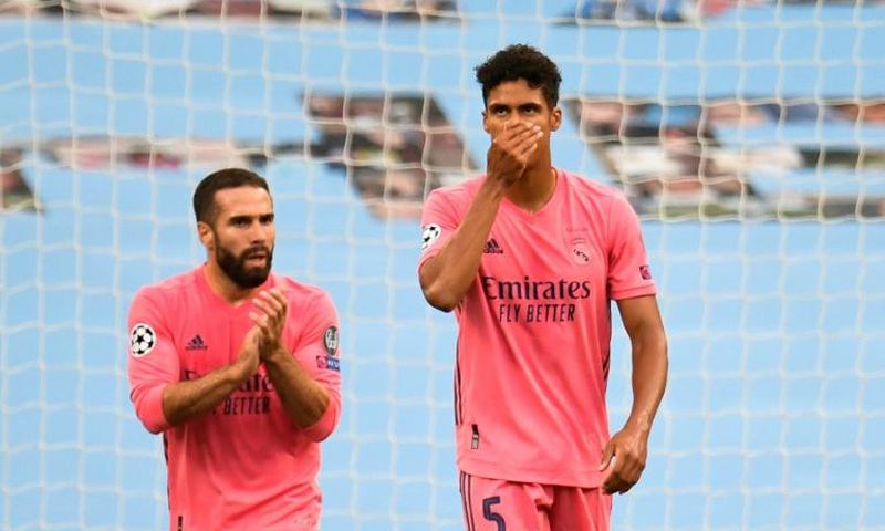 'Blame me': Real Madrid's French defender Raphael Varane (right) reacts after Manchester City's Raheem Sterling opened the scoring