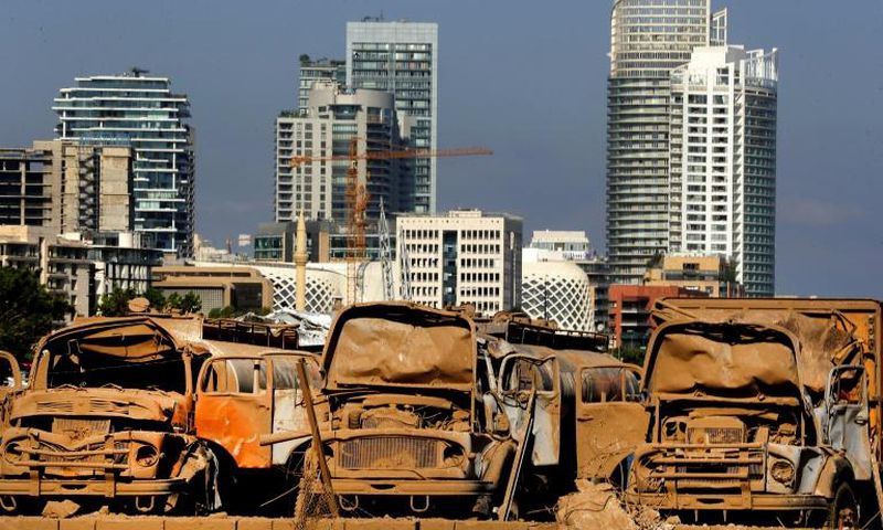 Destroyed trucks at Beirut port, three days after a massive blast devastated the Lebanese capital
