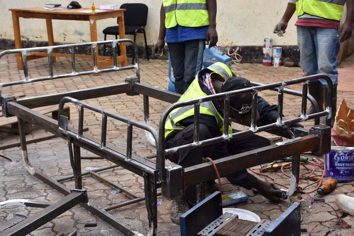 Welders in Githunguri work on local ICU bed innovation by Mungai Gathogo and Joseph Muhinja