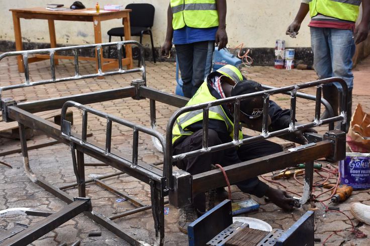 Welders in Githunguri work on local ICU bed innovation by Mungai Gathogo and Joseph Muhinja