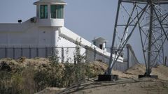Watchtowers on a high-security facility near an alleged "re-education" camp for Muslim ethnic minorities outside Hotan in China's Xinjiang region