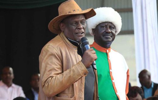 File image of David Murathe with Raila Odinga