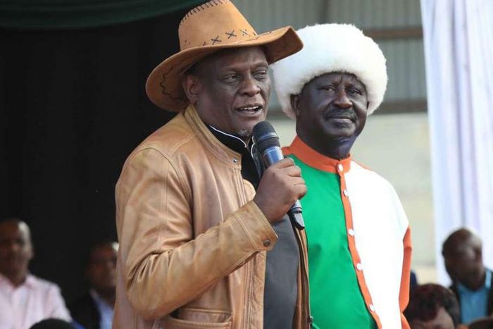 File image of David Murathe with Raila Odinga