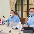 Thai Prime Minister Prayut Chan-O-Cha (R) attends a cabinet meeting Thursday