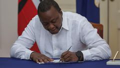 President Uhuru Kenyatta signing the IEBC (Amendment) Bill No. 3 at State House, Nairobi