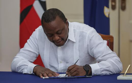 President Uhuru Kenyatta signing the IEBC (Amendment) Bill No. 3 at State House, Nairobi