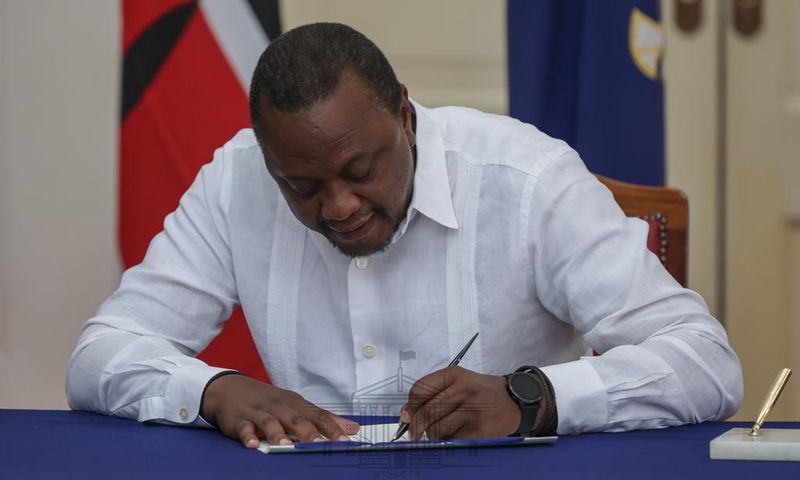 President Uhuru Kenyatta signing the IEBC (Amendment) Bill No. 3 at State House, Nairobi