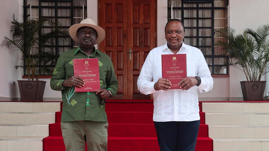 President Uhuru Kenyatta with former Prime Minister Raila Odinga