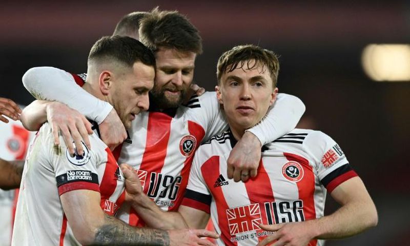 Billy Sharp (left)scored the winner as Sheffield United ended a 20-game run without a win in the Premier League