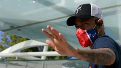 A masked Neymar leaves Paris Saint-Germain's hotel in Lisbon on Friday, as the French side prepare for the Champions League final against Bayern Munich this weekend