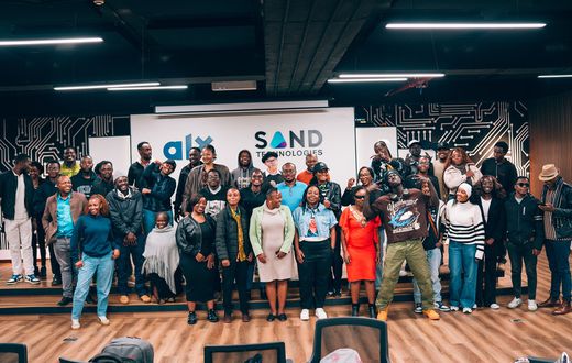 Group photo of the learners and Sol Generation team