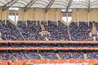 Football fans at Kasarani Stadium during a CHAN match