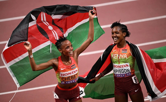 Beatrice Chebet (left) and Faith Kipyegon after agging gold and silver medals in the 5000m race at the World Athletics Championships in Tokyo, Japan