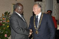 President Mwai Kibaki shakes the hand of His Highness Prince Karim Al Hussaini Aga Khan IV after bestowing the C.G.H. upon him, August 13, 2007