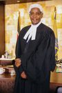 Linus Kaikai dons the advocate's gown and wig after admission to the Bar as an advocate of the High Court of Kenya