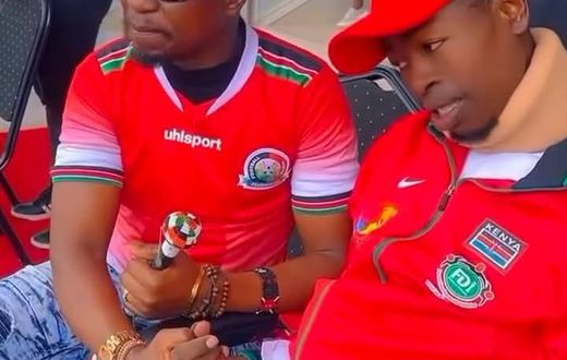 File image of the late Ezekiel Otuoma with former Sports CS Ababu Namwamba
