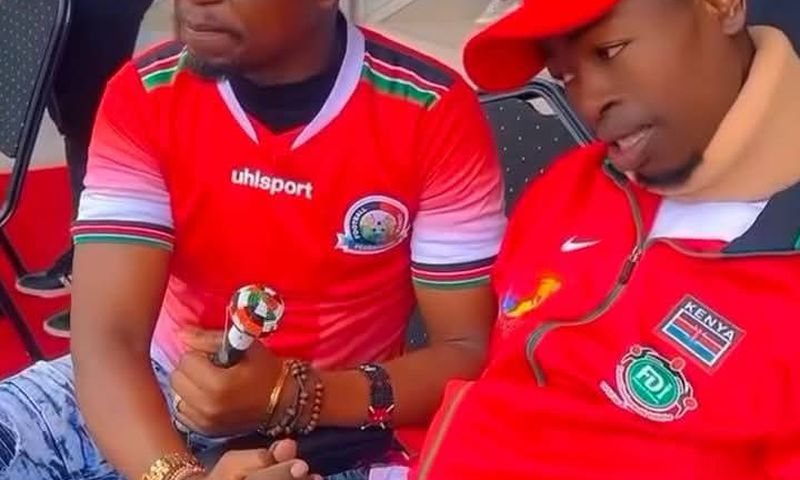 File image of the late Ezekiel Otuoma with former Sports CS Ababu Namwamba