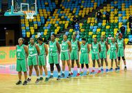 Team Lionesses sing the Kenya national anthem during the FIBA Women's AfroBasket 2021 Zone 5 qualifiers match between hosts Rwanda and Kenya at Kigali Arena in Kigali, Rwanda on July 16, 2021.