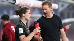 Bayern Munich head coah Julian Nagelsmann (R) speaks to Marcel Sabitzer, who made his club debut at Leipzig on Saturday