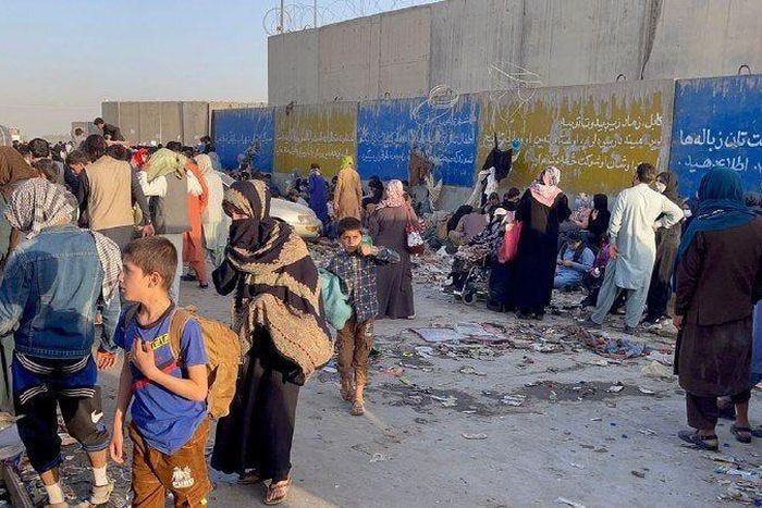 People who want to flee the country continue to wait around Hamid Karzai International Airport in Kabul, Afghanistan on August 25, 2021.