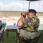 President Uhuru Kenyatta watching Kenyan security officers undertaking a joint operational training in Boni Forest, Lamu County.