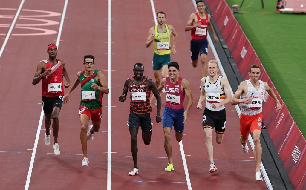 Poland's Patryk Dobek (R) crosses the finish line to win ahead of second-placed Kenya's Emmanuel Kipkurui Korir (3L) and third-placed Mexico's Jesus Tonatiu Lopez in the men's 800m semi-finals during the Tokyo 2020 Olympic Games at the Olympic Stadium in Tokyo on August 1, 2021. (Photo by Giuseppe CACACE / AFP) (Photo by GIUSEPPE CACACE/AFP via Getty Images)