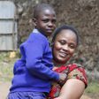 Jacqueline Khalenya embraces her son Rhonick Omondi