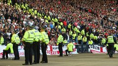 Lines of police separate rival England and Scotland supporters