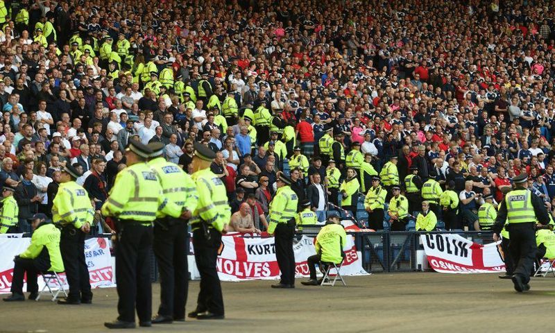 Lines of police separate rival England and Scotland supporters