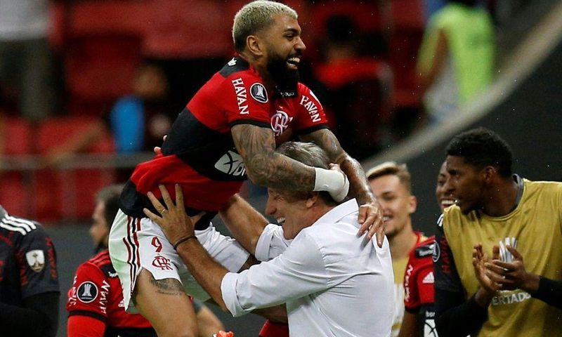Flamengo's Gabriel Barbosa celebrates with his coach Renato Gaucho after scoring against Olimpia of Paraguay in the Copa Libertadores quarter-finals last month