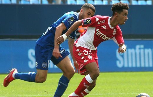 Monaco's Sofiane Diop escaping Oualid El Hajjam of Troyes