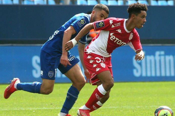 Monaco's Sofiane Diop escaping Oualid El Hajjam of Troyes