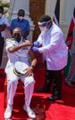 Receiving the Covid-19 booster shot at State house , Nairobi